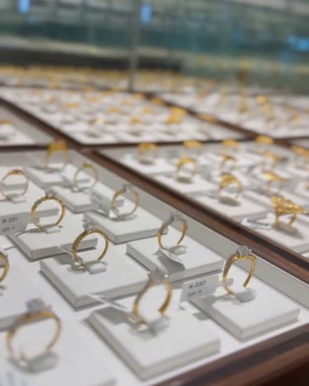 Trays of gold rings in the display case at Shreeji Jewellers, Nadi
